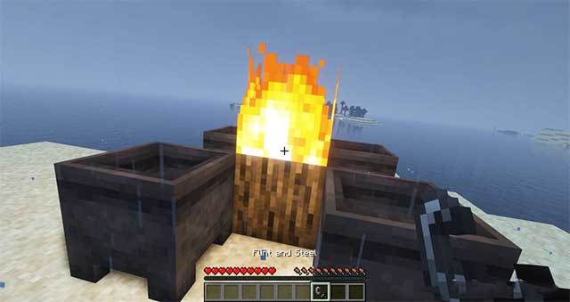 Place cauldrons (min 4, max 8) around the log and burn the log